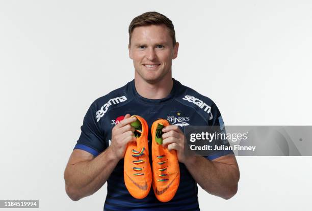 Chris Ashton of Sale Sharks poses for a portrait with rainbow laces on his boots in support of the Stonewall Rainbow Laces Campaign, promoting...