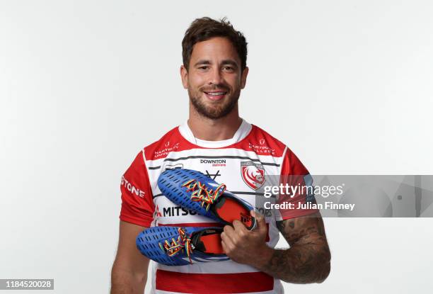 Danny Cipriani of Gloucester Rugby poses poses for a portrait with rainbow laces on his boots in support of the Stonewall Rainbow Laces Campaign,...