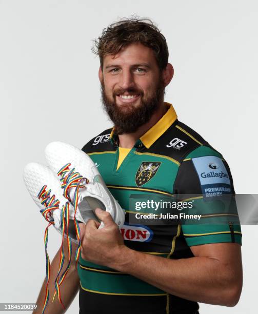 Tom Wood of Northampton Saints poses for a portrait with rainbow laces on his boots in support of the Stonewall Rainbow Laces Campaign, promoting...