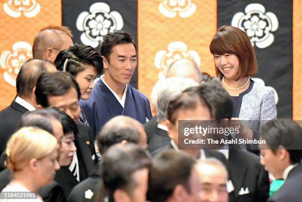 Kaori Icho, Takuma Sato and Naoko Takahashi attend the 'Kyoen-no-Gi' banquet celebrating the enthronement at the Imperial Palace on October 29, 2019...