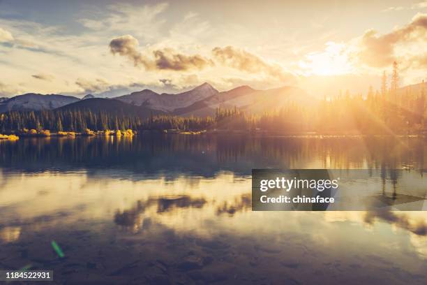 scenic view of forget-me-not pond at twilight - kananaskis country stock pictures, royalty-free photos & images