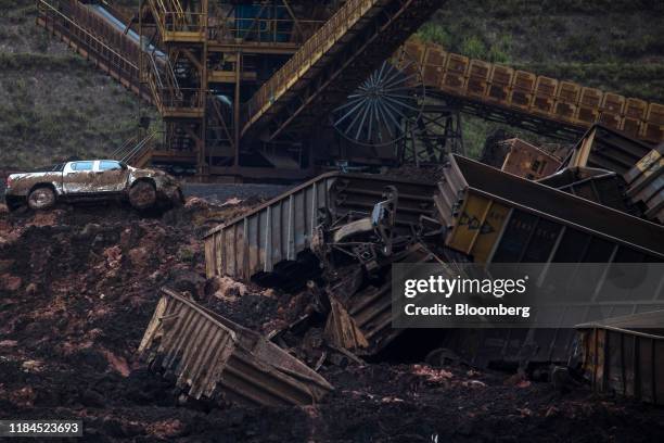 Bloomberg Best of the Year 2019: A pick up truck sits among shattered debris after a dam breach at the Vale SA iron ore mine in Brumadinho, Minas...