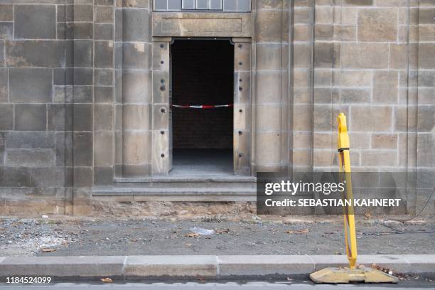 Police cordon tape hangs on at an entrance to the catacombs where a fire paralyzed the power supply of the State Art Collections in the early morning...