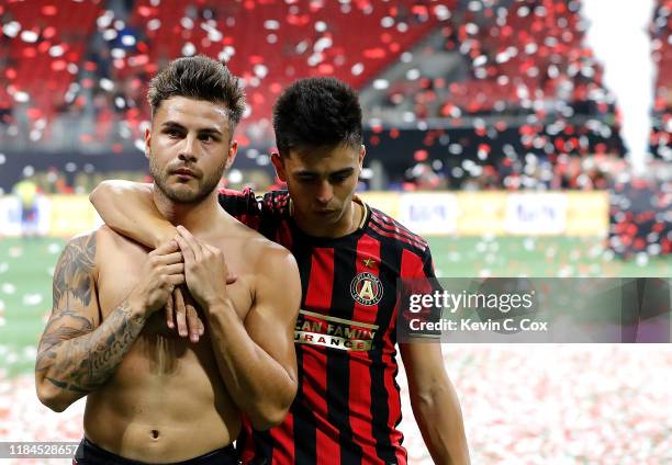 Hector Villalba and Pity Martinez of Atlanta United react after their 2-1 loss to Toronto FC in the Eastern Conference Finals between Atlanta United...