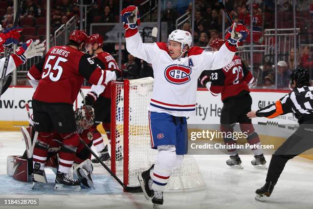 Brendan Gallagher of the Montreal Canadiens celebrates after scoring a goal against goaltender Antti Raanta of the Arizona Coyotes during the first...