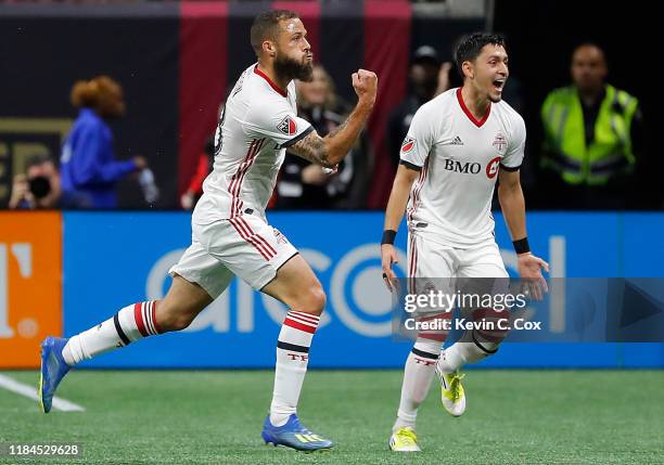 Nick DeLeon of Toronto FC celebrates after scoring the go-ahead goal against the Atlanta United in the Eastern Conference Finals between Atlanta...