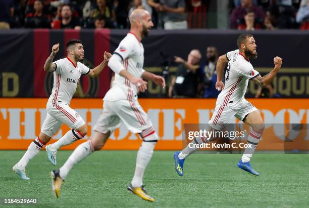 Nick DeLeon of Toronto FC celebrates after scoring the go-ahead goal against the Atlanta United in the Eastern Conference Finals between Atlanta...