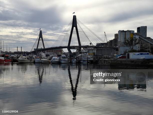 anzac bridge on johnstons bay, sydney, australia - glebe island bridge stock pictures, royalty-free photos & images