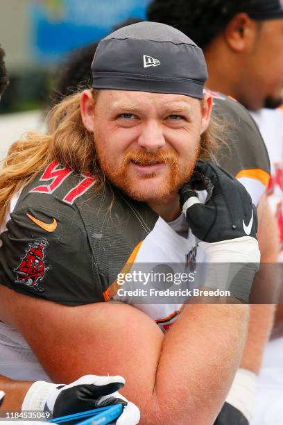 Beau Allen of the Tampa Bay Buccaneers watches from the sideline during a game against the Tennessee Titans at Nissan Stadium on October 27, 2019 in...