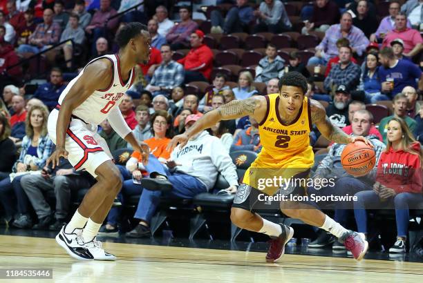 Arizona State Sun Devils guard Rob Edwards and St. John's Red Storm guard Mustapha Heron in action during the college basketball game between Arizona...