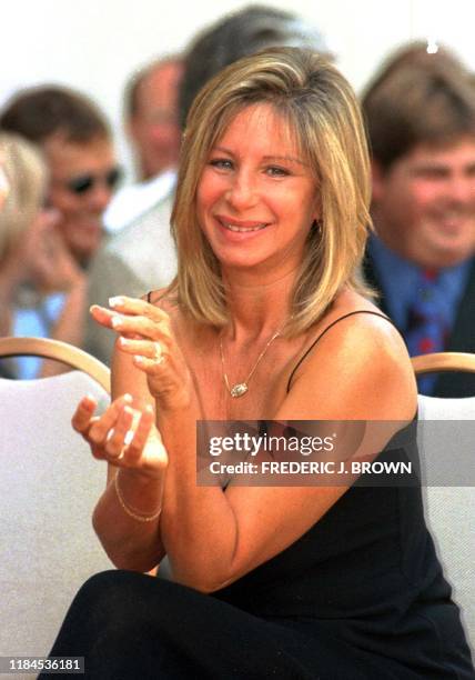 Singer and actress Barbra Streisand smiles during the Hollywood Walk of Fame star ceremony for her husband actor James Brolin 27 August in Hollywood,...