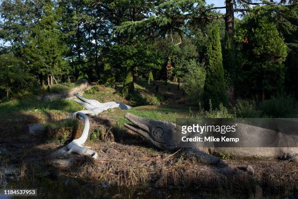 Dinosaur sculptures in Crystal Palace in London, United Kingdom. The Crystal Palace Dinosaurs are a series of sculptures of dinosaurs and other...
