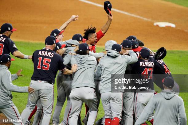 The Washington Nationals celebrate after defeating the Houston Astros in Game Seven to win the 2019 World Series at Minute Maid Park on October 30,...