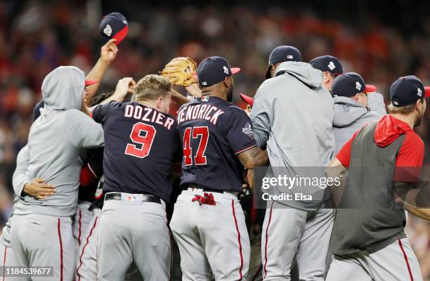 The Washington Nationals celebrate after defeating the Houston Astros in Game Seven to win the 2019 World Series at Minute Maid Park on October 30,...