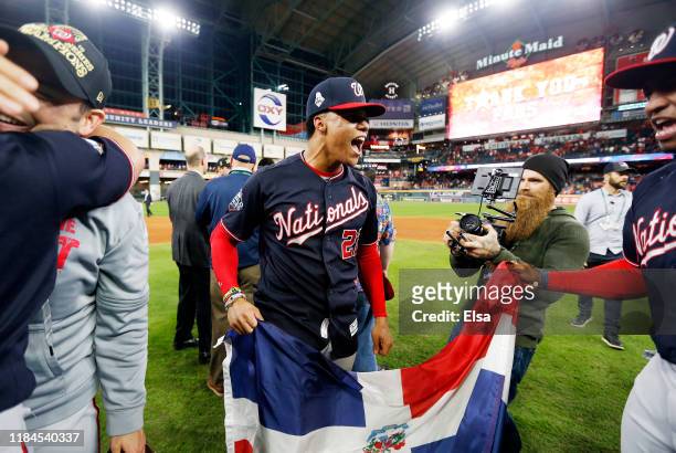 Juan Soto of the Washington Nationals celebrates after defeating the Houston Astros 6-2 in Game Seven to win the 2019 World Series in Game Seven of...