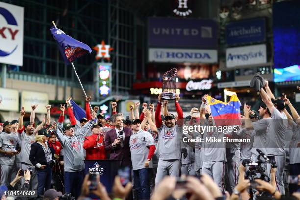 The Washington Nationals celebrate after defeating the Houston Astros in Game Seven to win the 2019 World Series at Minute Maid Park on October 30,...