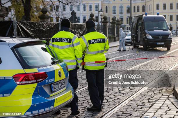 Police stand outside Residenzschloss palace that houses the Gr¸nes Gewlbe collection of treasures on November 25, 2019 in Dresden, Germany. Thieves,...