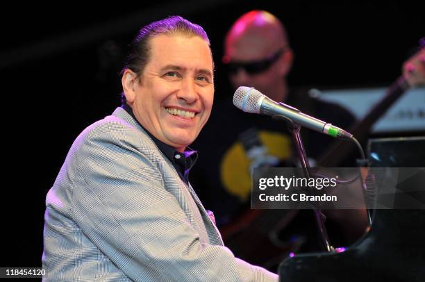 Jools Holland performs on stage during Kew The Music Festival at Kew Gardens on July 7, 2011 in London, United Kingdom.