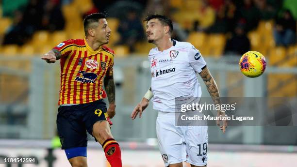Gianluca Lapadula for the ball in air with FAbio Pisacane of Cagliari during the Serie A match between US Lecce and Cagliari Calcio at Stadio Via del...
