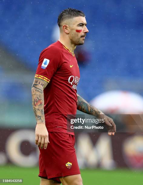 Aleksandar Kolarov of Roma in action with a red mark on face in campaign to stop domestic violence against women during the Serie A match AS Roma v...