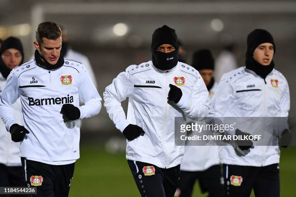 Bayer Leverkusen's players take part in a training session at Moscow's RZD Arena on November 25, 2019 on the eve of the UEFA Champions League group D...