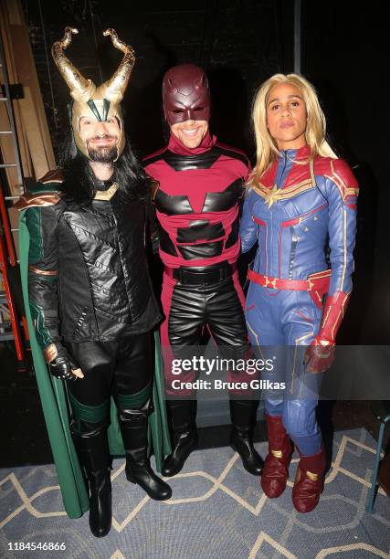 Charlie Cox as "Loki", Tom Hiddleston as "Daredevil", and Zawe Ashton as "Captain Marvel" pose as the Broadway cast of "Betrayal" celebrate Halloween...