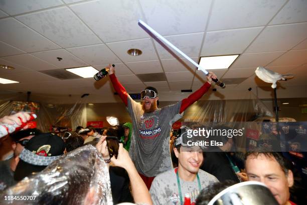 Sean Doolittle of the Washington Nationals celebrates in the locker room after defeating the Houston Astros in Game Seven to win the 2019 World...