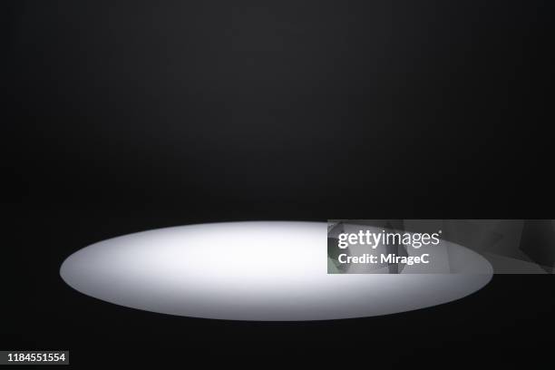 illuminated spotlight in the dark - stage light black background stock pictures, royalty-free photos & images