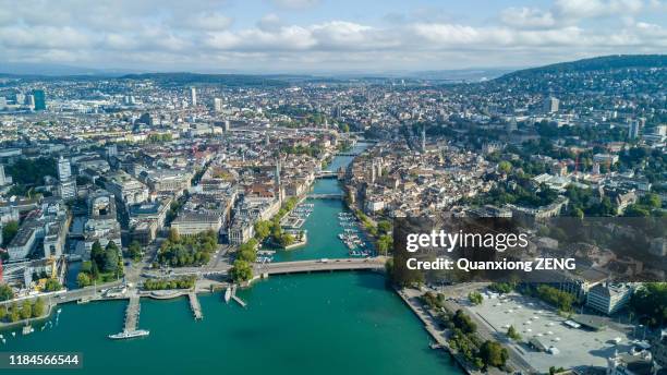 beautiful aerial drone shot view of zurich city and lake in switzerland - zurich skyline stock-fotos und bilder