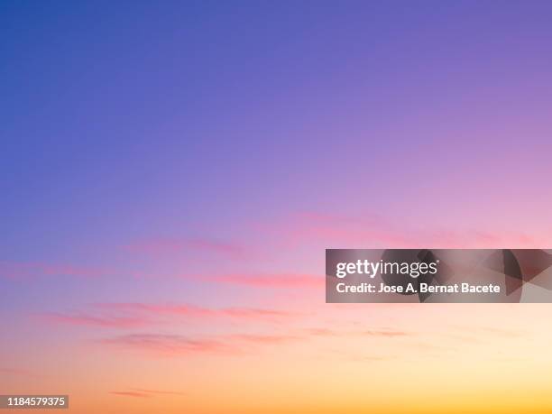 full frame of the low angle view of clouds in sky during sunset. - sky full frame stock pictures, royalty-free photos & images