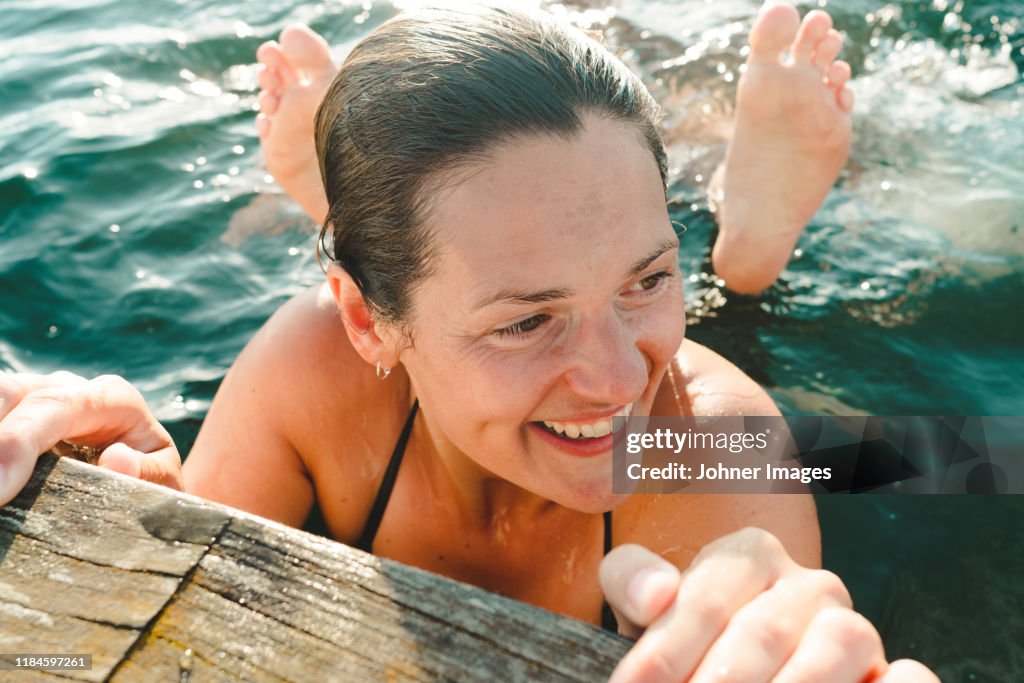 Happy woman in sea