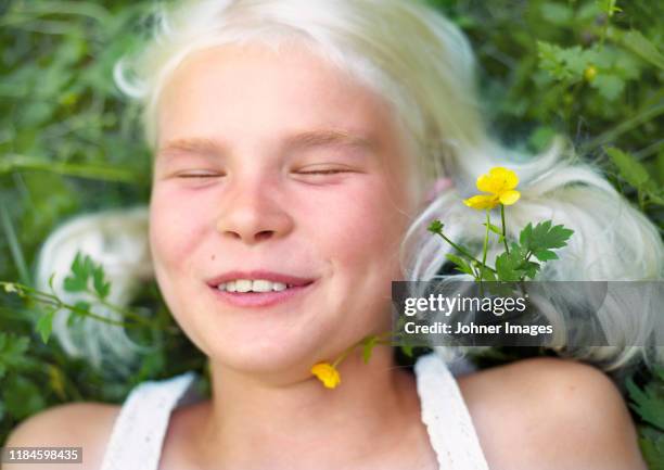 smiling girl with eyes closed - albino stock pictures, royalty-free photos & images