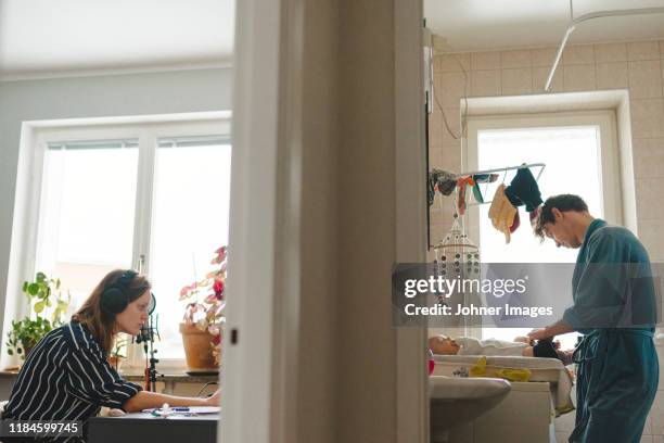 family at home - inequality stock pictures, royalty-free photos & images