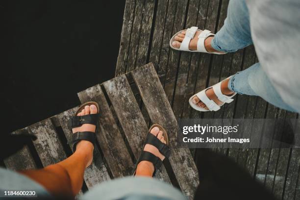 people wearing sandals - sandal stock pictures, royalty-free photos & images
