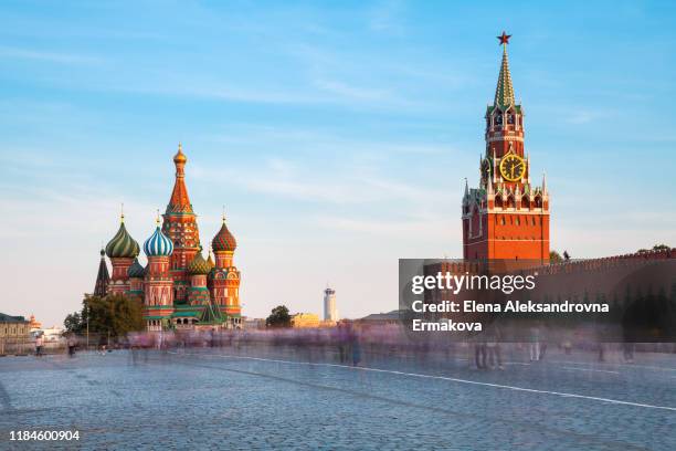 view of the red square with st. basil's cathedral and spasskaya tower, moscow, russia - red square stock pictures, royalty-free photos & images