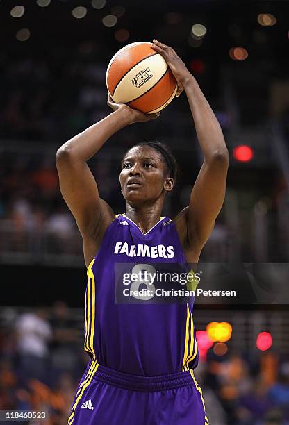 DeLisha Milton-Jones of the Los Angeles Sparks shoots a free throw shot during the WNBA game against the Phoenix Mercury at US Airways Center on July...