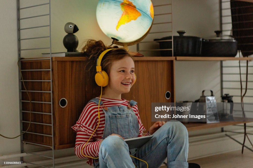 Girl using digital tablet