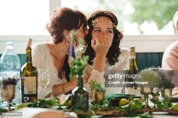 brides at wedding reception - gay marriage stockfoto's en -beelden