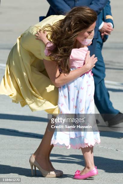 Catherine, Duchess of Cambridge speaks with 6 year old terminal cancer sufferer Diamond at Calgary Airport on day 8 of the Royal couple's tour of...