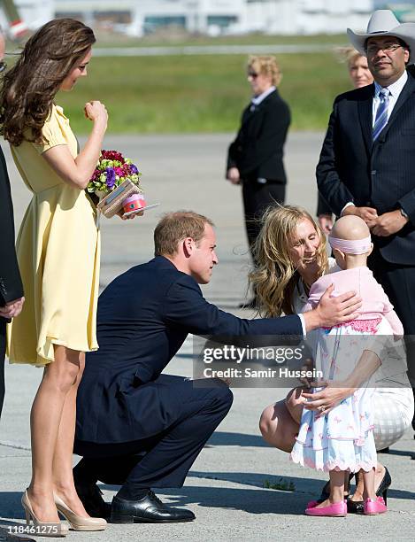 Prince William, Duke of Cambridge and Catherine, Duchess of Cambridge speak with 6 year old terminal cancer sufferer Diamond at Calgary Airport on...