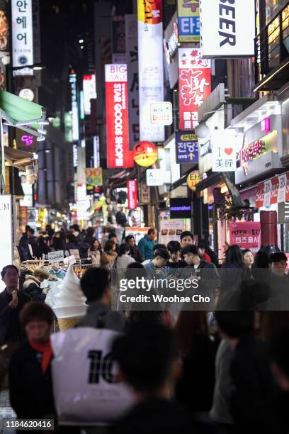 Tourists shopping in Myong-dong Street, the downtown shopping area in Seoul, South Korea on October 31, 2019. North Korea fired two short-range...