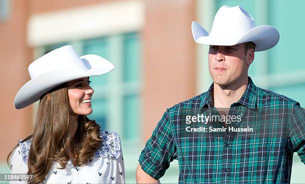 Catherine, Duchess of Cambridge and Prince William, Duke of Cambridge arrive at a Government Reception at the BMO Centre on day 8 of the Royal...