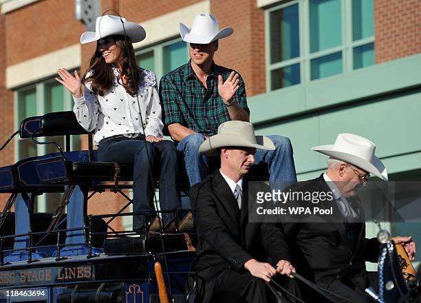 Catherine, Duchess of Cambridge and Prince William, Duke of Cambridge wear their new Smithbilt cowboy hats riding a carriage as they arrive for a...