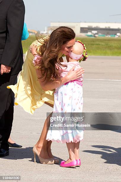 Catherine, Duchess of Cambridge speaks with 6 year old terminal cancer sufferer Diamond at Calgary Airport on day 8 of the Royal couple's tour of...