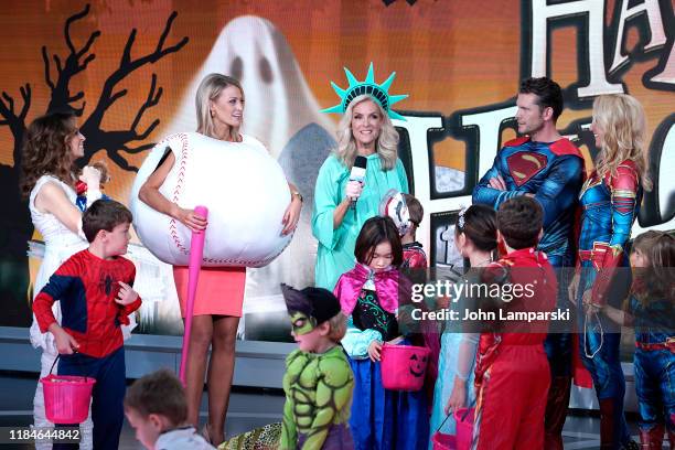 Fox anchors Jedediah Bila, Carley Shimkus, Janice Dean, Pete Hegseth, Jennifer Rauchet and children participate in "Fox & Friends" Halloween...