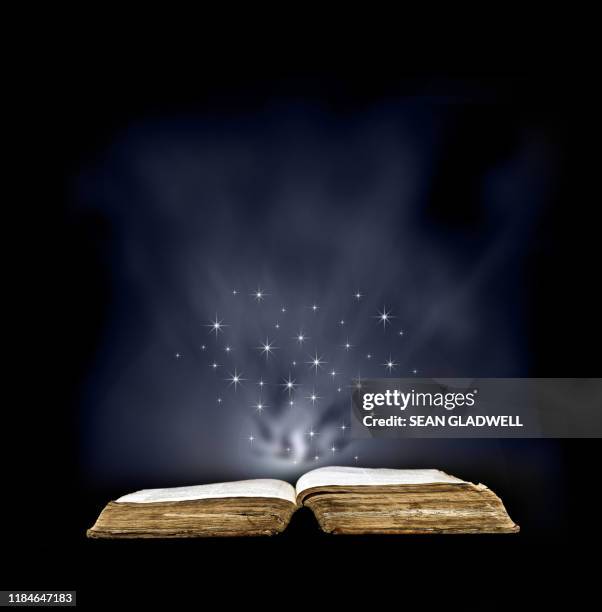 magic spell book - wizzard stock pictures, royalty-free photos & images