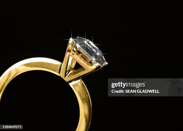 close up diamond ring - engagement stock pictures, royalty-free photos & images