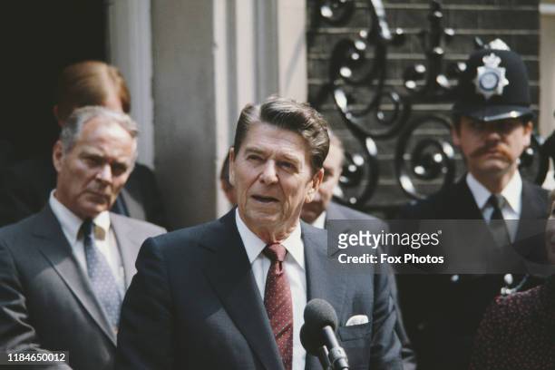 President Ronald Reagan and US Secretary of State Alexander Haig outside 10 Downing Street during a state visit to London, UK, 9th June 1982.