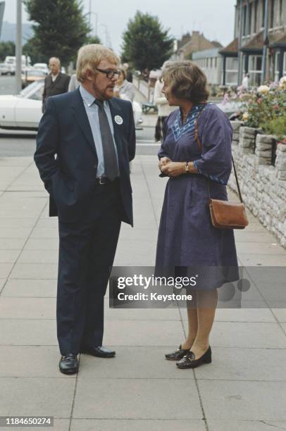 British politician Bill Pitt , the SDP/Liberal candidate in the Croydon North West by-election, out canvassing with SDP politician Shirley Williams,...