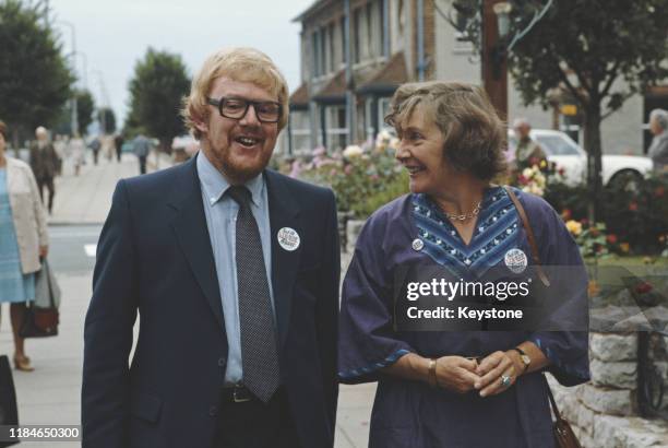 British politician Bill Pitt , the SDP/Liberal candidate in the Croydon North West by-election, out canvassing with SDP politician Shirley Williams,...